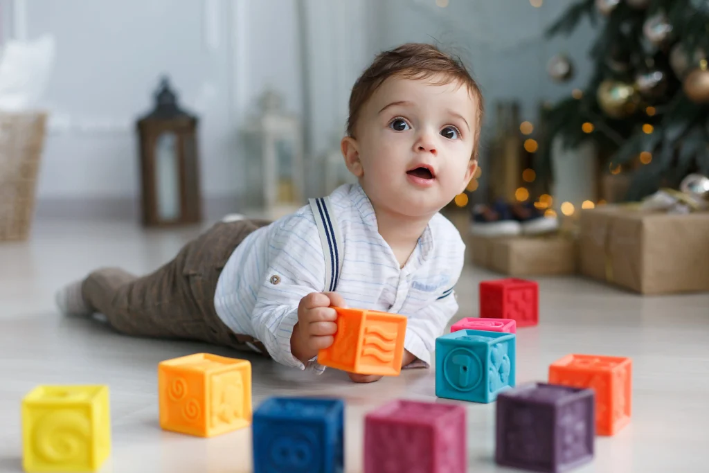 cute baby playing with toys