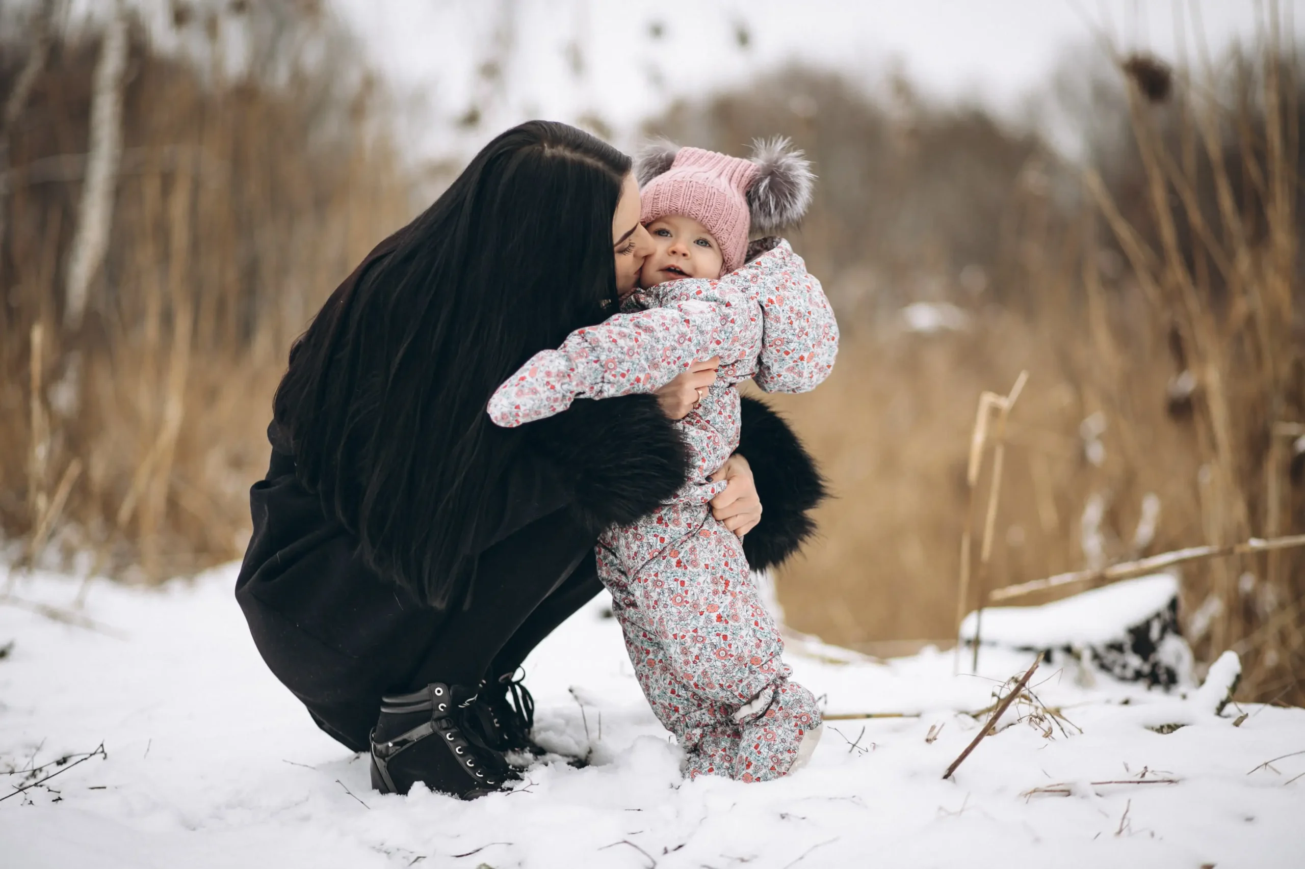 mother daughter outside in winter